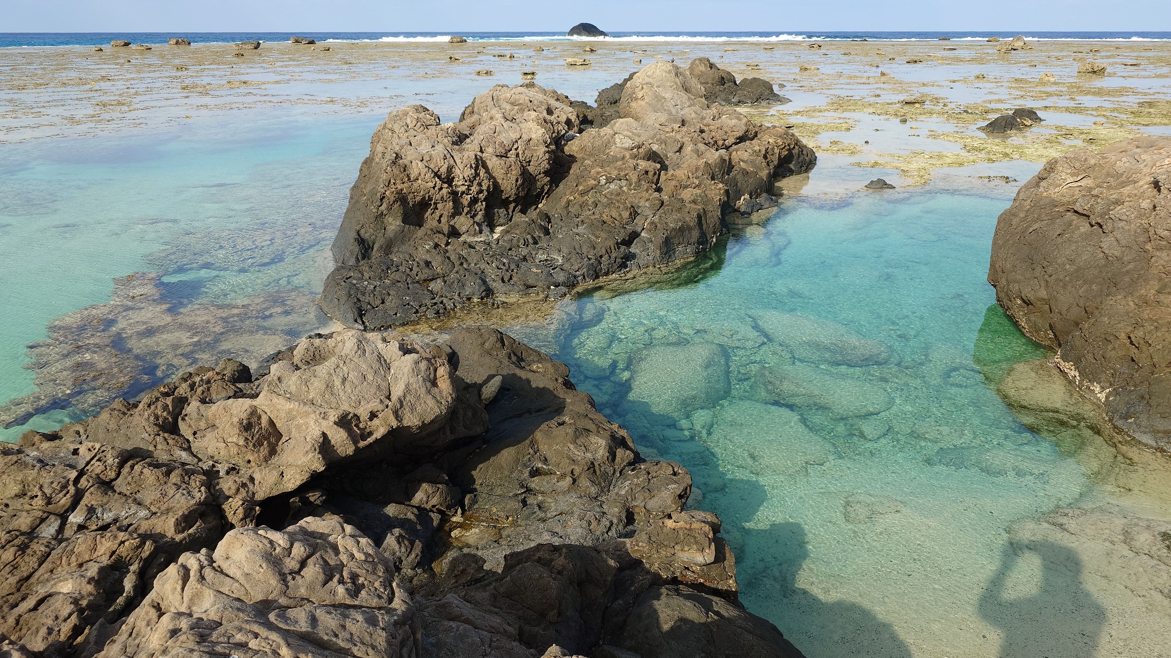 The reefs and Amami Blue sea at Ayamaru Cape