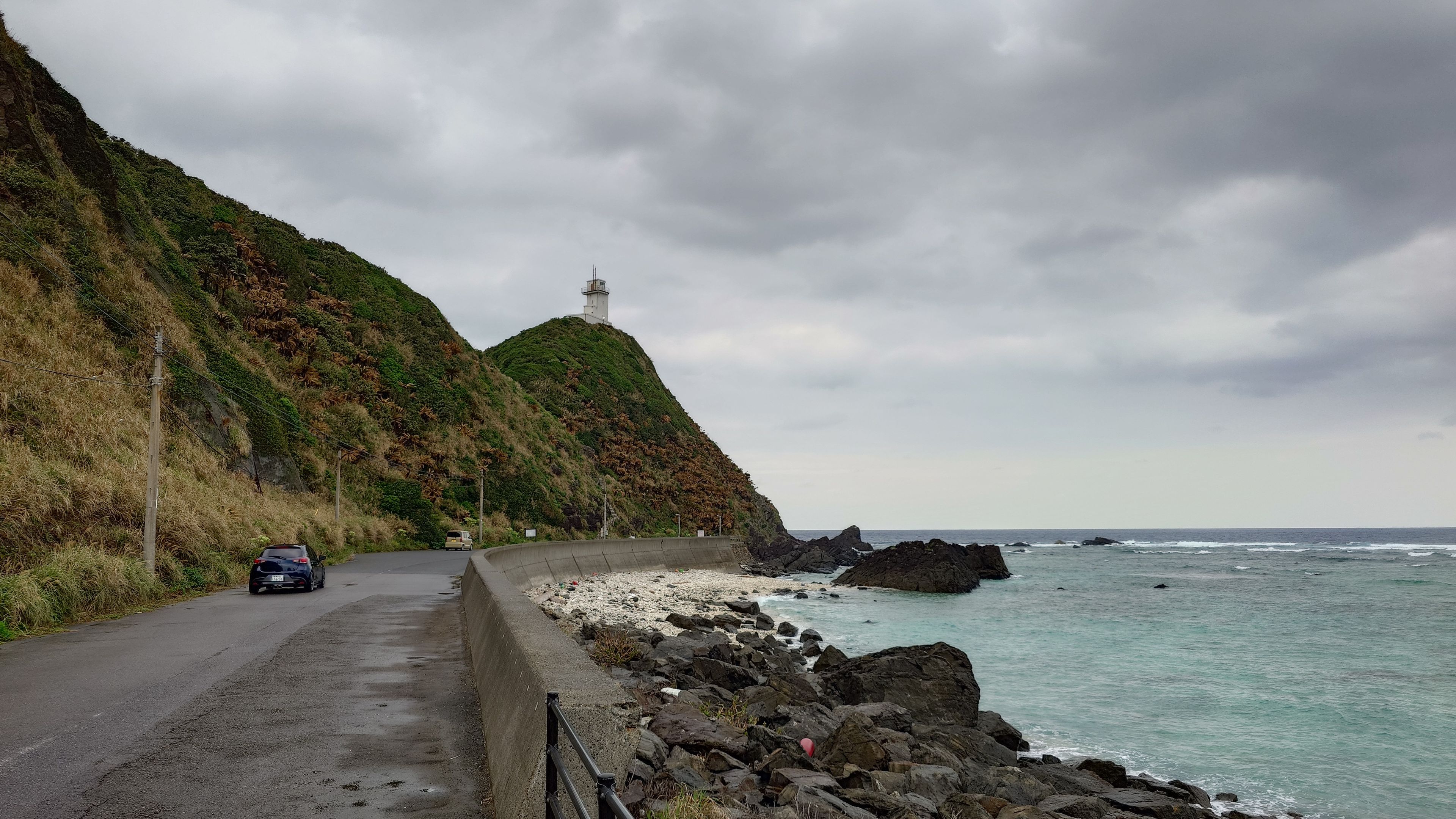 Cape Kasarizaki Lighthouse - lighthouse at the end of the cape with the Amami sea on the right