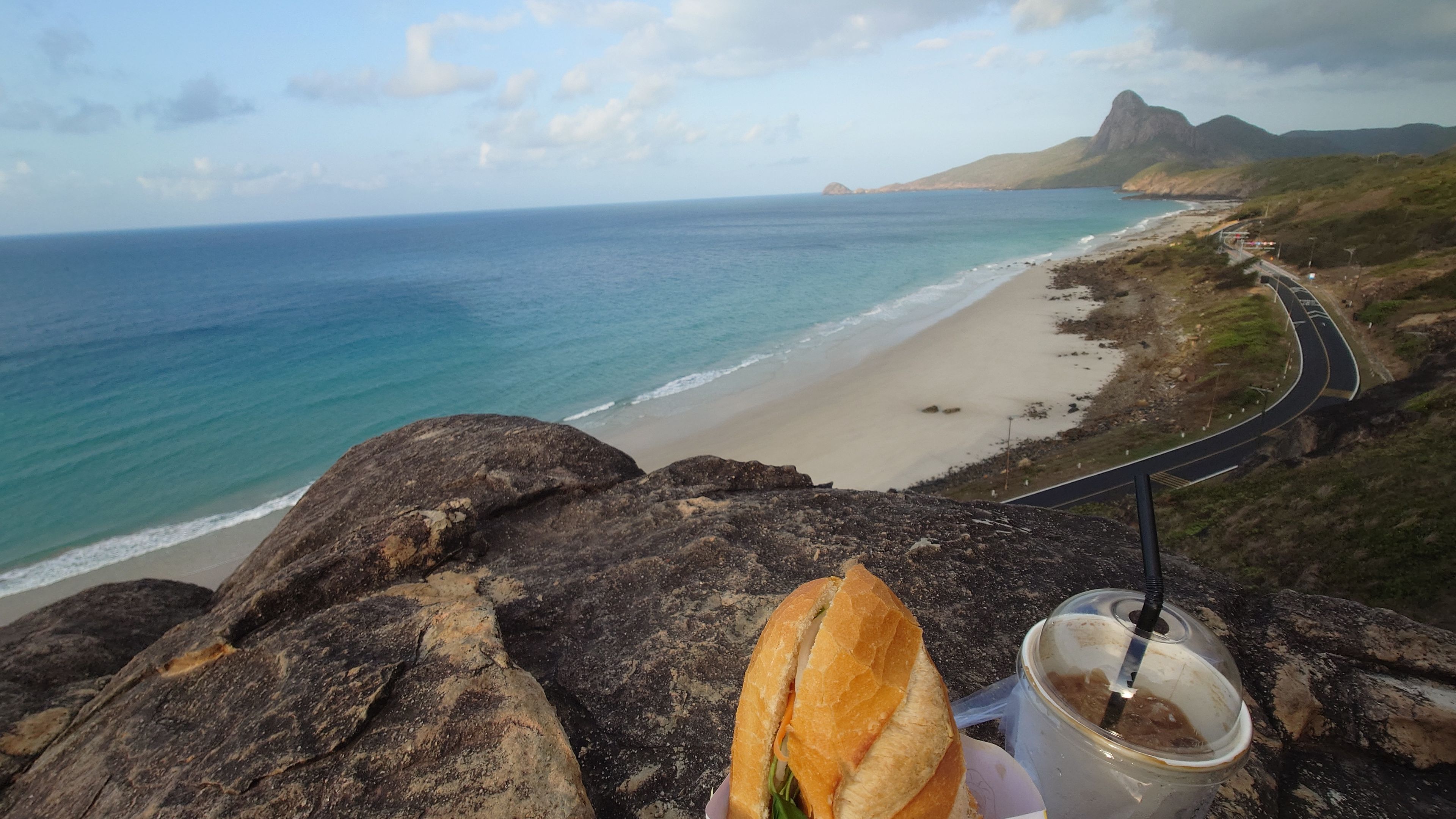 Enjoying banh mi and coffee at Bai Nhat in the early morning