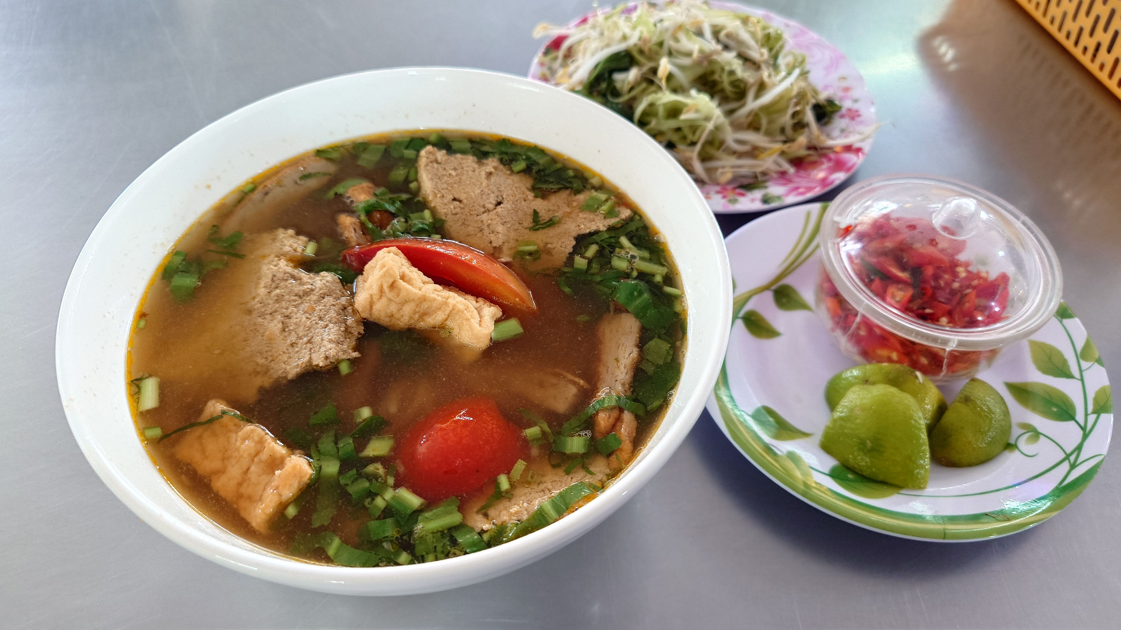 Bún riêu cua with the essence of field crab. The rich tomato soup is exquisite.