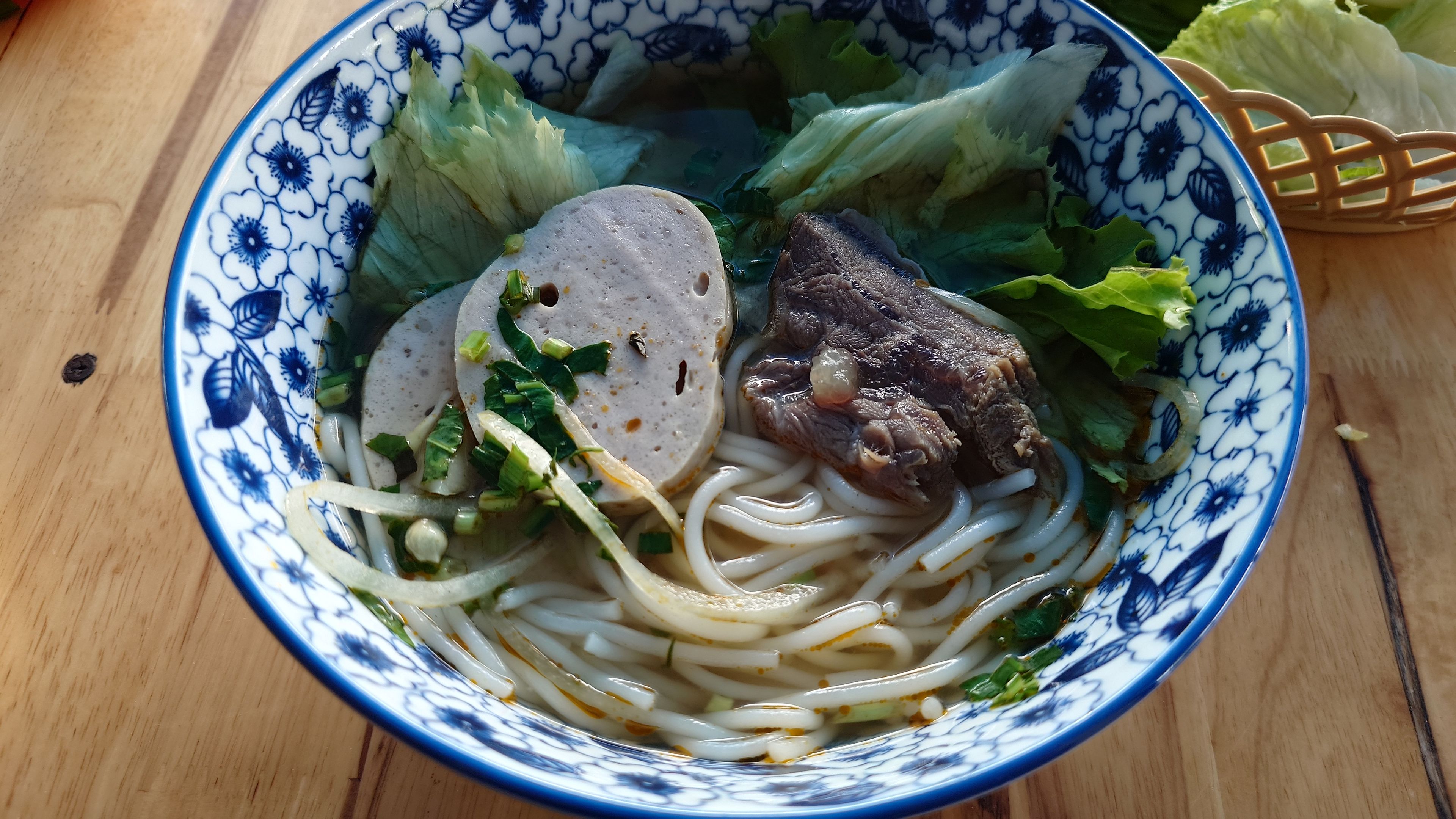 Bún Bò Huế with a deep red appetizing soup