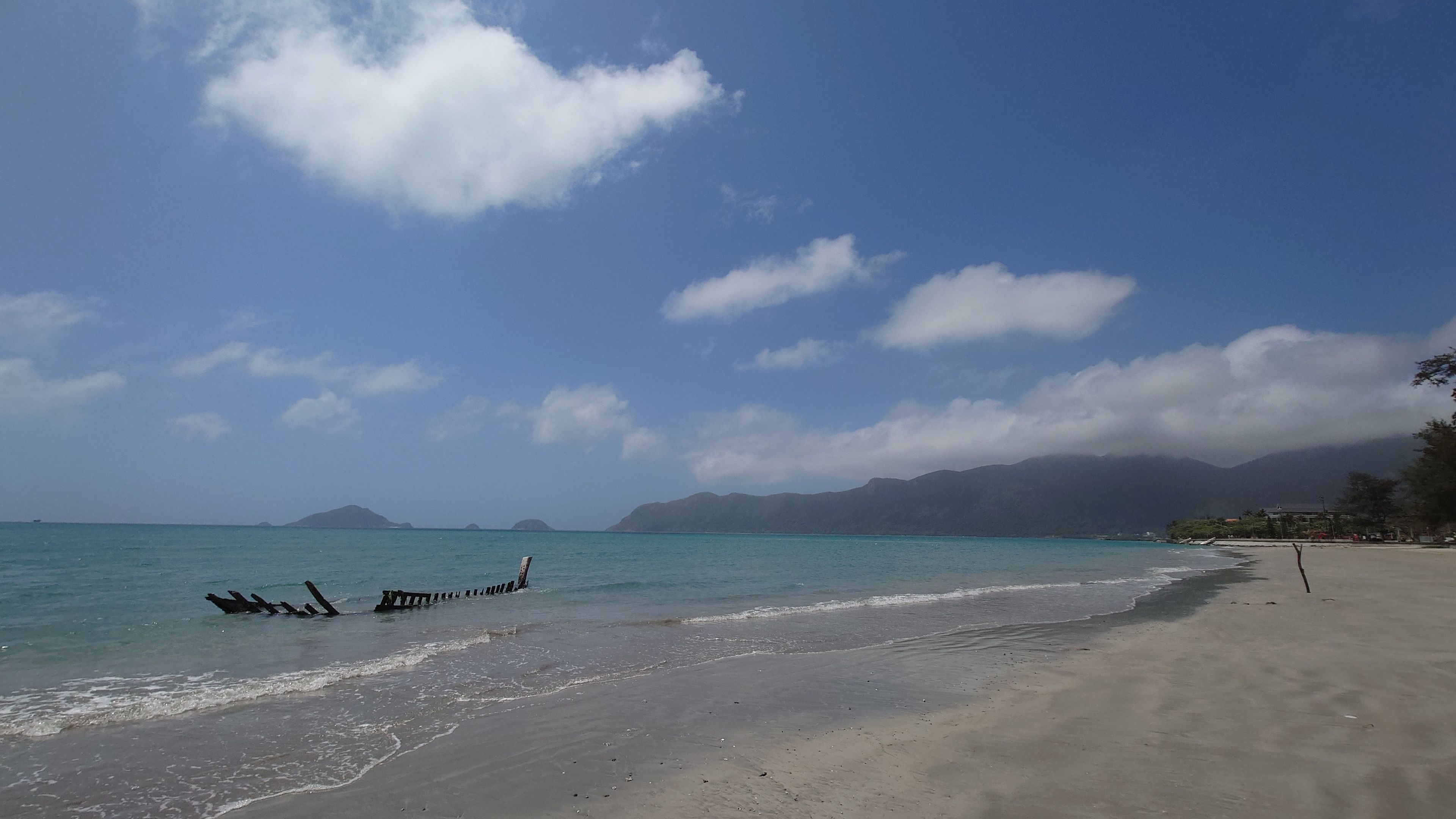 The shallow, transparent water surface of Lo Voi Beach