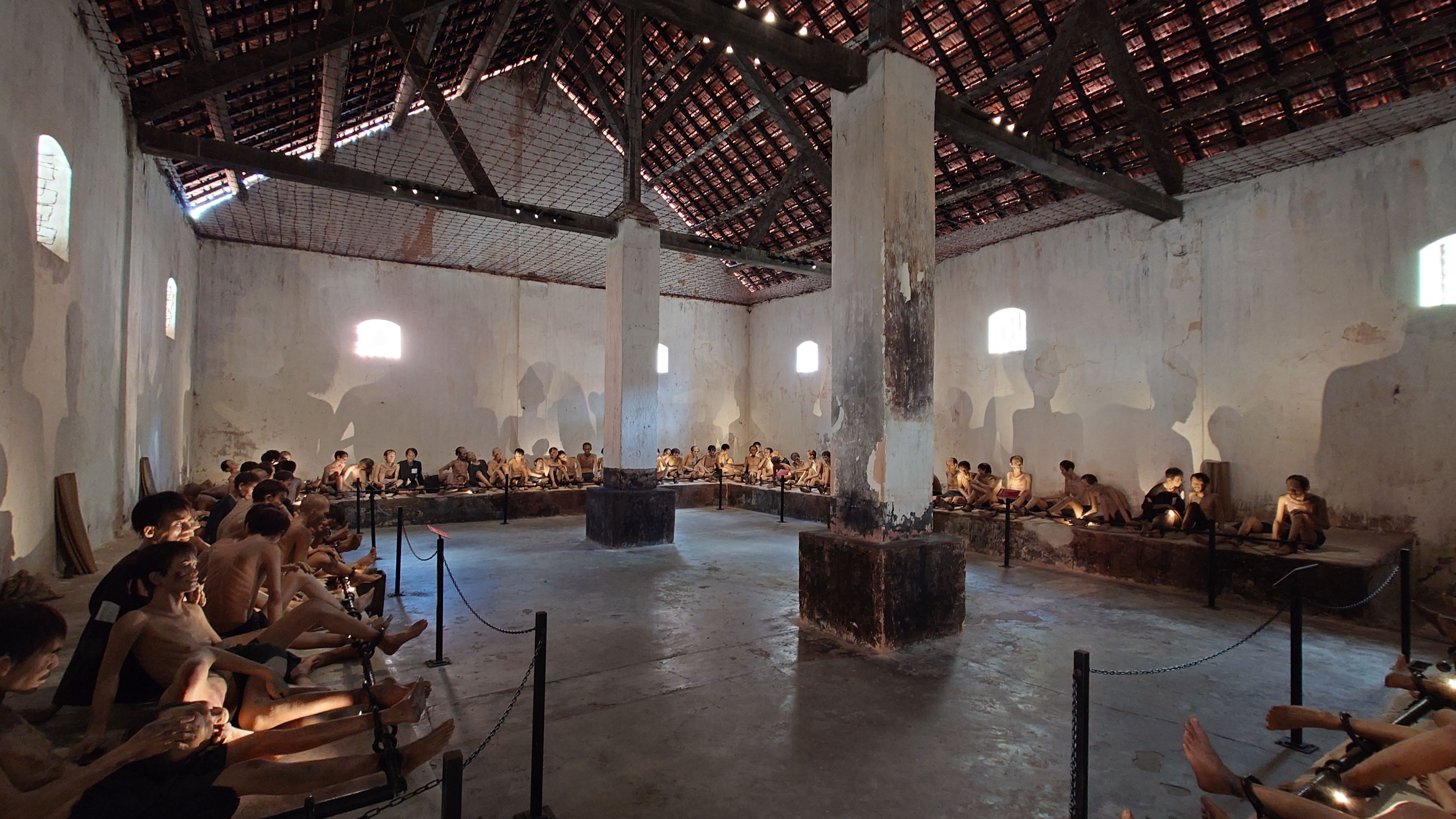 The prison courtyard. Contrastingly peaceful shade spreads over the historical site
