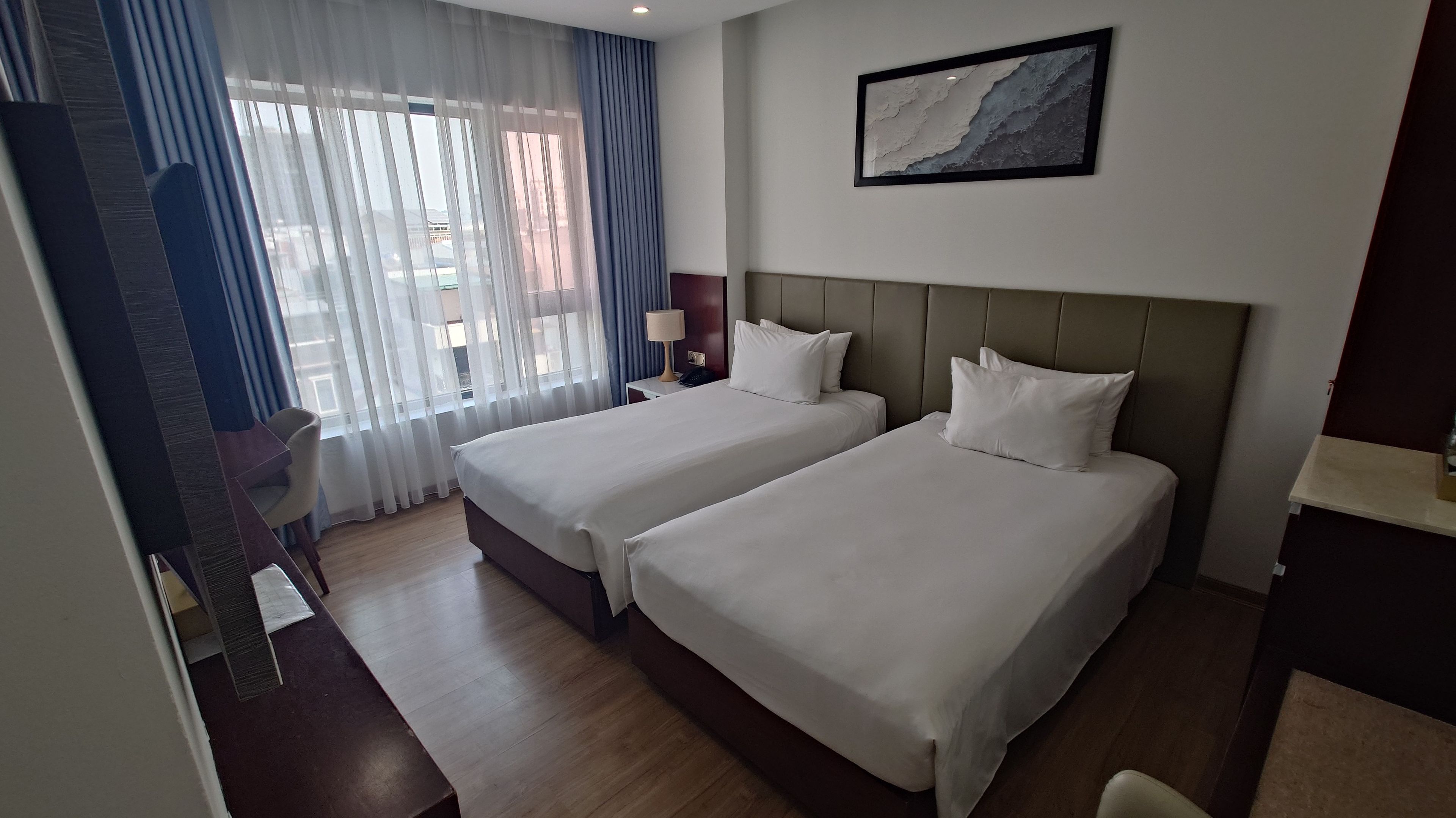 Bright and clean guest room with natural light